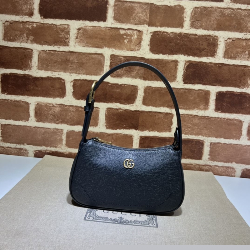 G*u*i top handle bags